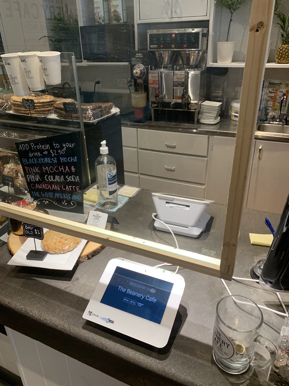 The Beanery Cafe counter with Clover minis